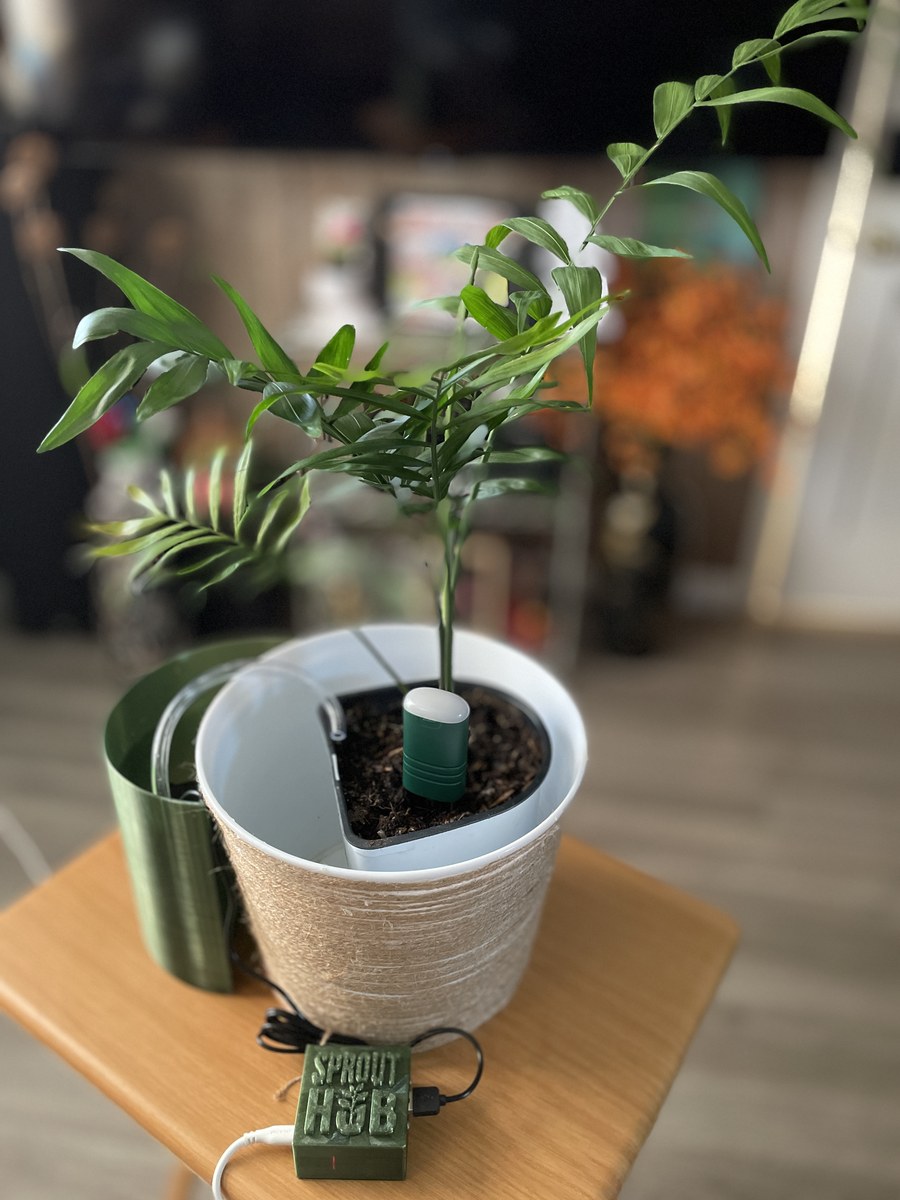 SproutKeeper complete setup with SproutHub, soil sensor, USB pump and Quartermoon water container